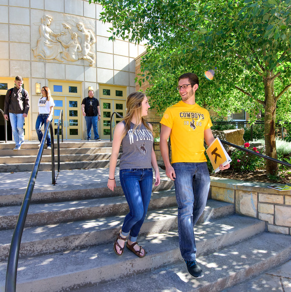 Students walking down stairs 