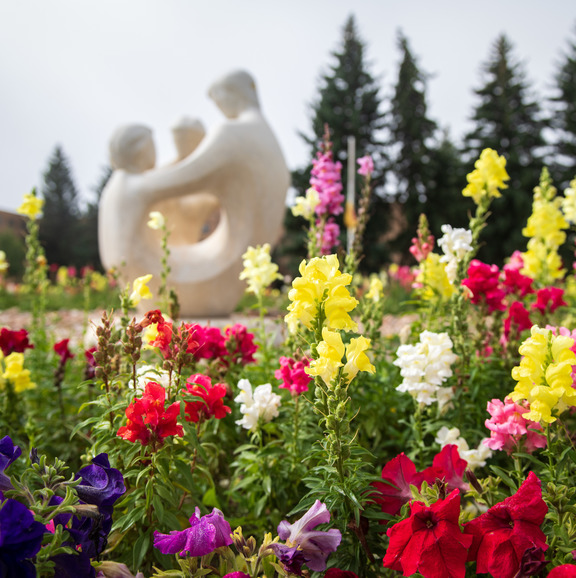 Flower garden with statue.
