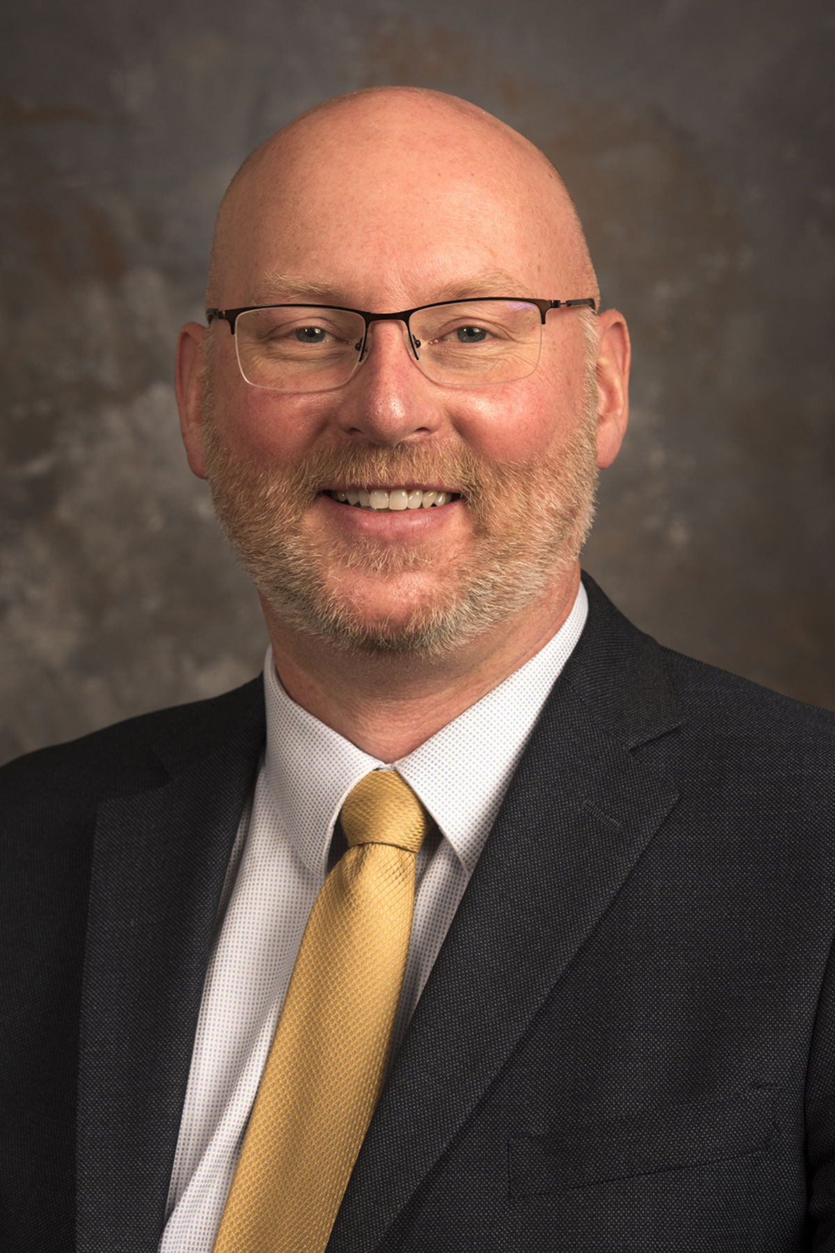 A headshot of VP James Ahern