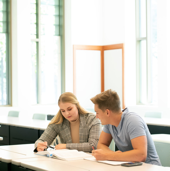 two students at a desk