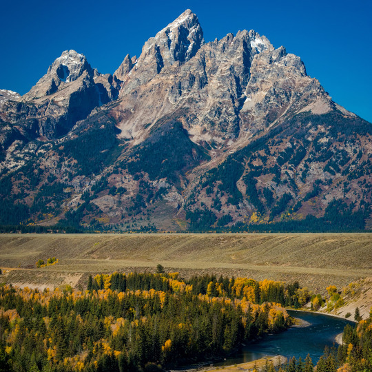 a river and mountains in Grand Teton National Park