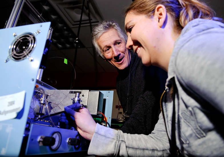 A professor and student in a lab