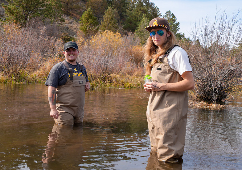 Two students in the river