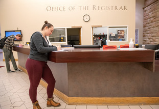 Student at the registrar. 