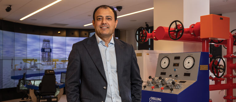professor in the drilling simulator lab
