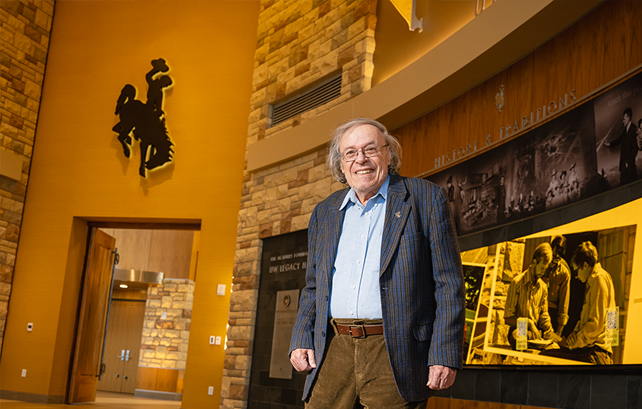 An older man stands in Legacy Hall in the Gateway Center