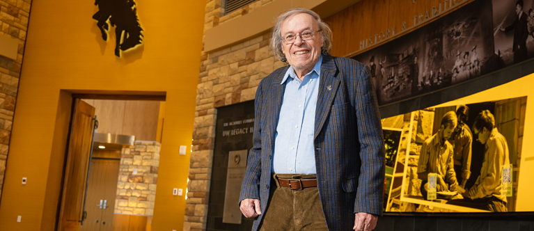 man poses in Legacy Hall at the Gateway Center