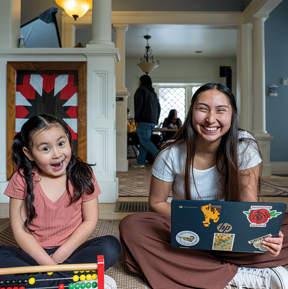woman and her child in the Native American Research Center