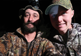 Scholarship recipient Michael McDaniel hunting at Aspen Alley with his son Hunter.