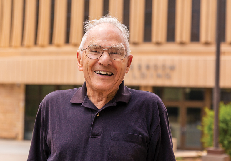 Older man in front of UW Classroom building