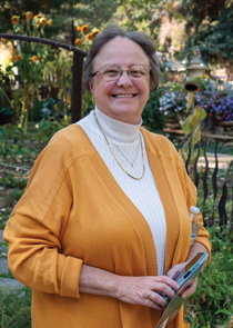 Amy Morgan in a garden