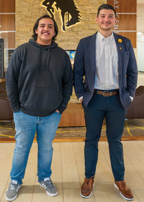 Two men standing in the Gateway Center