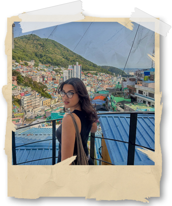 Woman overlooking a city in South Korea