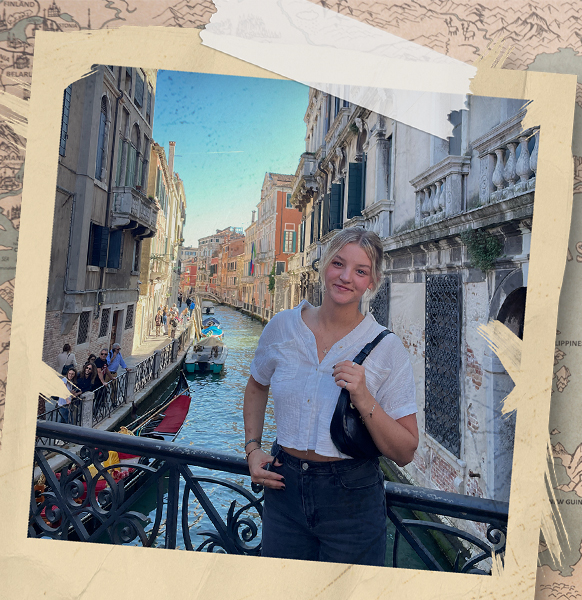 woman standing on a bridge over water in Italy