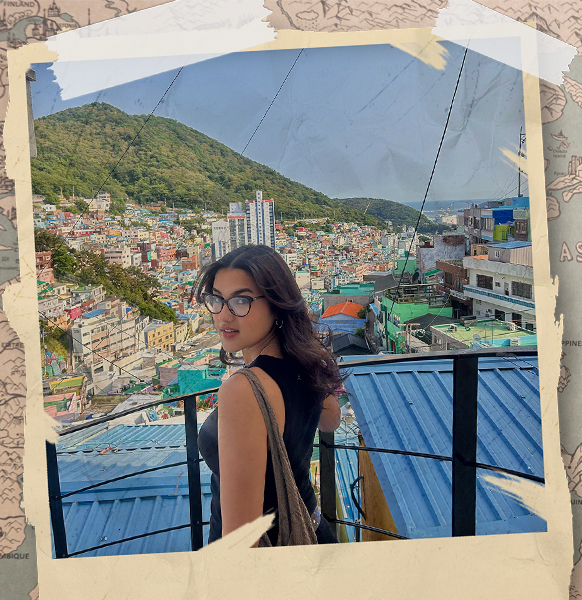 Woman overlooking a city in South Korea