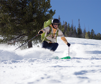 person skiing down a mountain