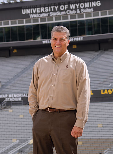 man stand on the field in football stadium