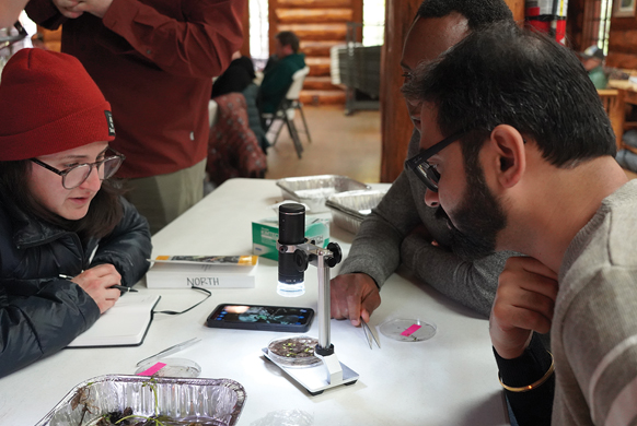 teachers at a table learning an experiment
