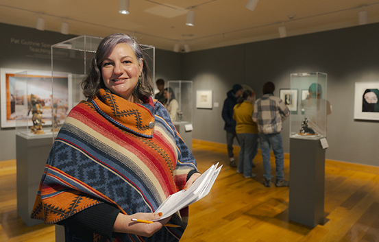 female professor in the Art Museum with students