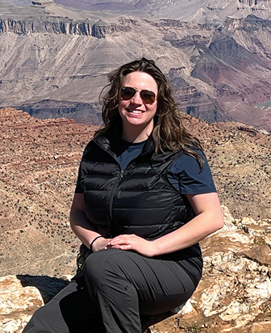 woman sitting on a rock in the Grand Canyon