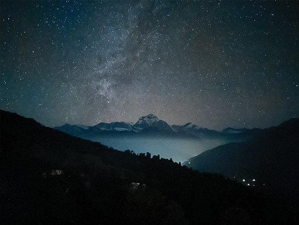 starry night sky with mountains