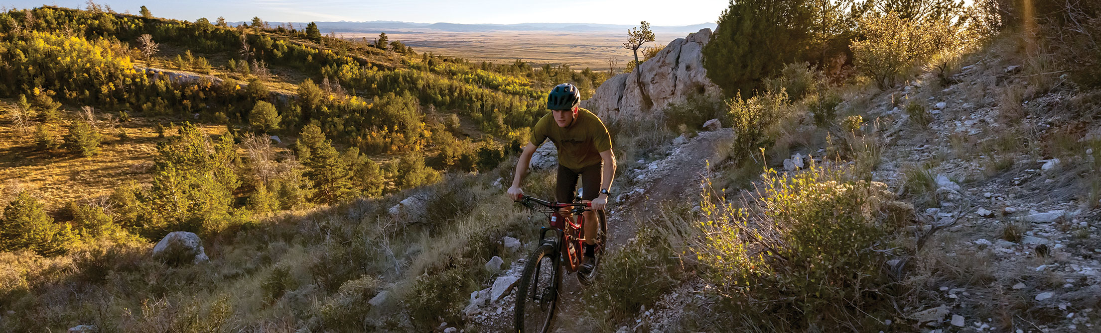 person mountain biking