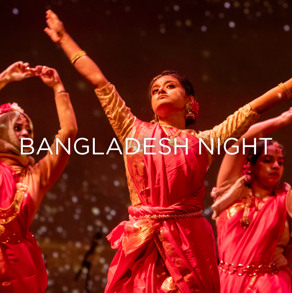 women dancing in traditional Bangladesh clothing