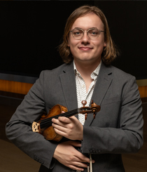 person holding a violin