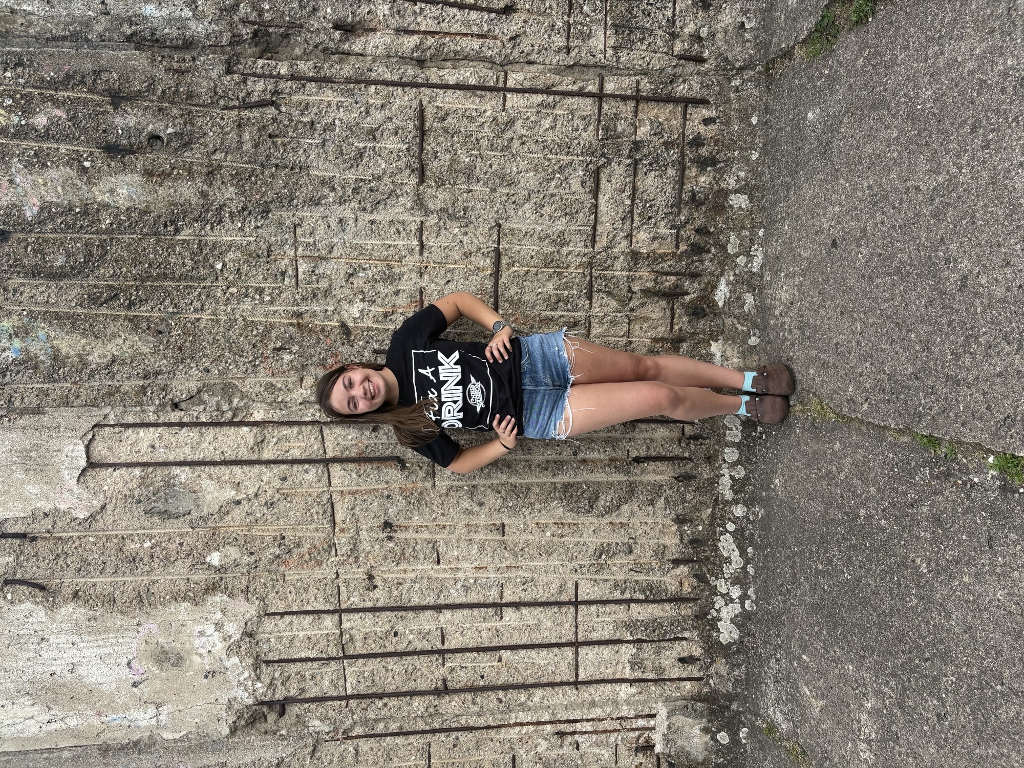 Emma Henry in front of wall on study abroad in Germany and Poland