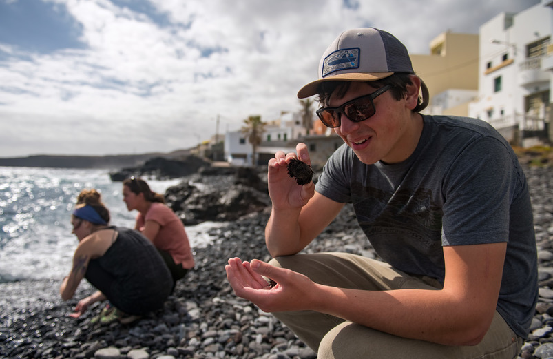 Student looking at rocks in the Canary Islands