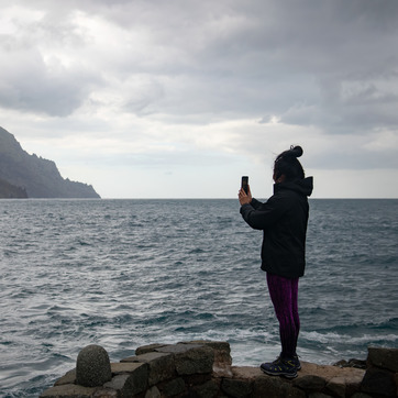 Student taking picture in New Zealand
