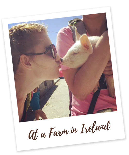 Kissing a pig on a farm in Ireland