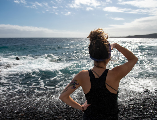 Student on a study abroad looking out at the ocean