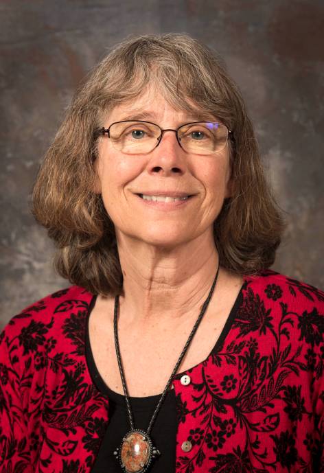 woman with glasses and a red sweater