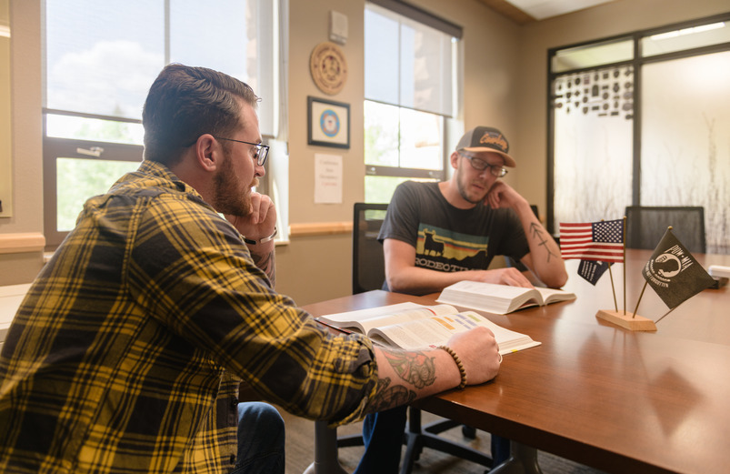 Two veteran students studying together.