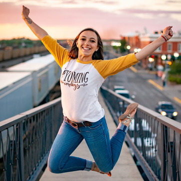 A student jumps in the air