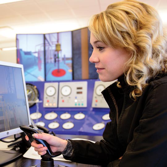 Picture of a woman in an engineering lab