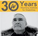 A black and white portrait of Jim Warne with the text "30 Years, Wyoming Institute for Disabilities" above it.
