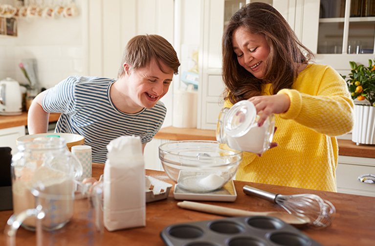 two people bake together