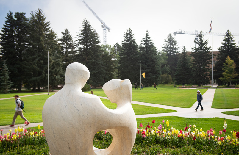Statue in a grassy area.