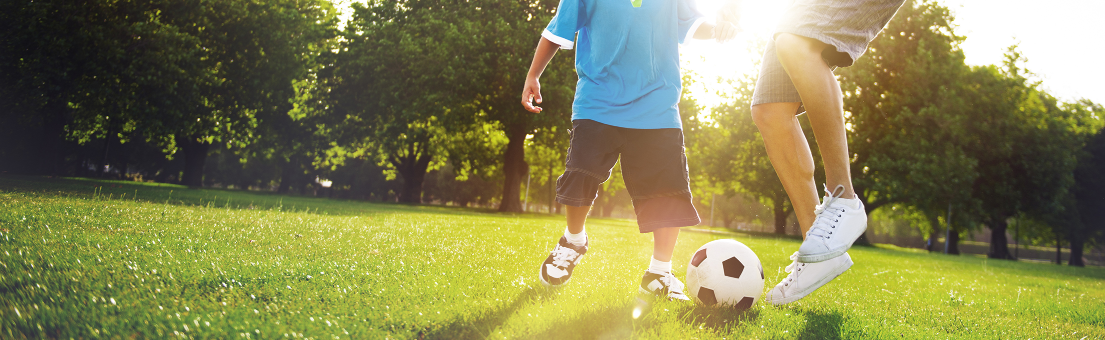 two people playing soccer