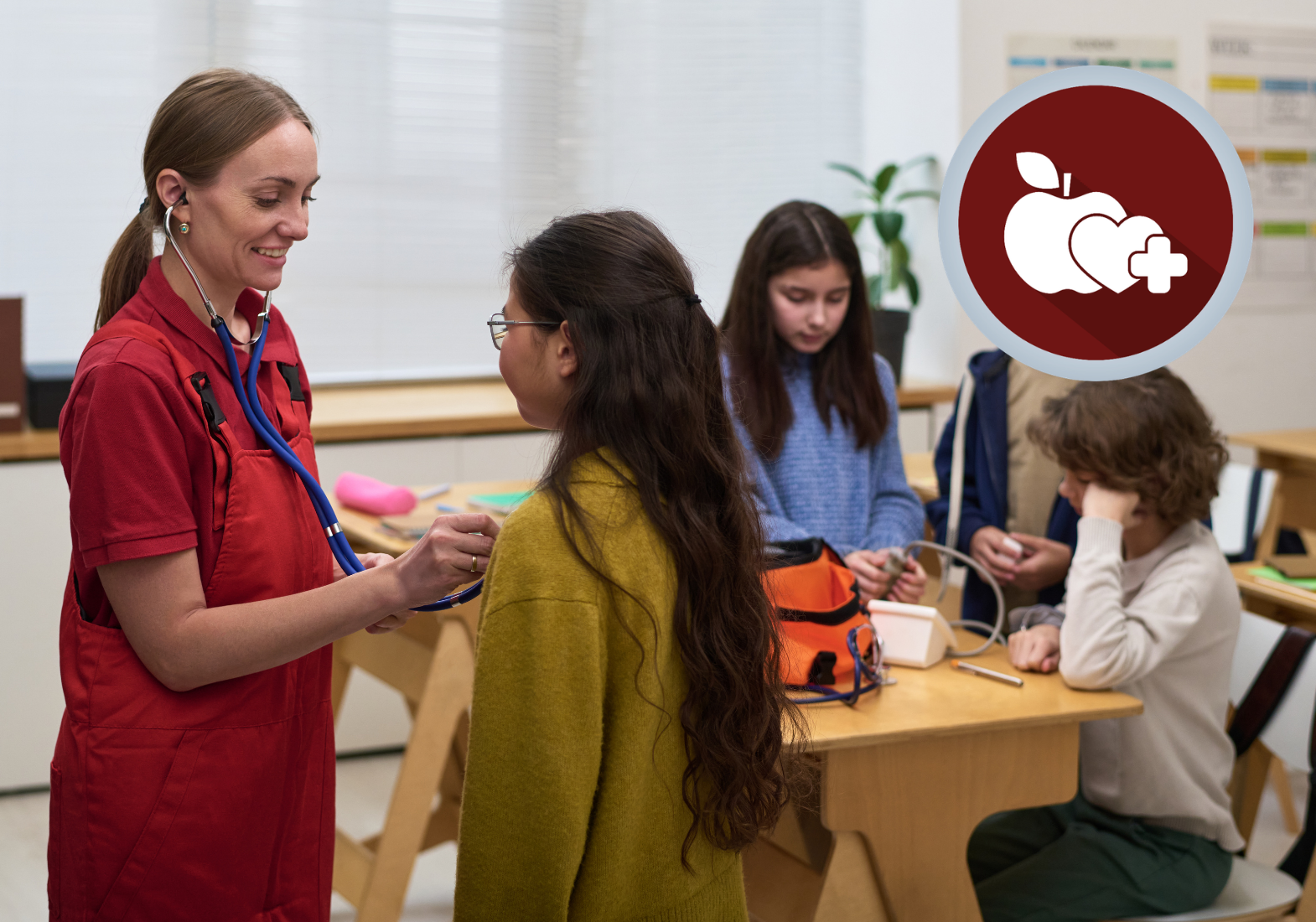 A nurse checking the heartbeat of a child.