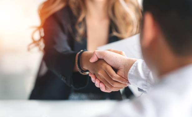 two people shaking hands