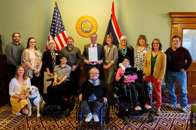 WATR Council Faculty and Staff members with Governor Mark Gordon holding the proclamation signing