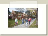 participants walking in front of Coe Library