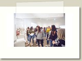 participants examine Art Museum exhibit