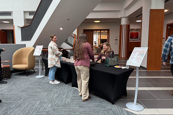 Elizabeth Blau signs copies of her book, "Honey Salt: A Culinary Scrapbook," in the Jonah Bank Atrium at the University of Wyoming on Tuesday, March 3, 2026, in Laramie, Wyoming