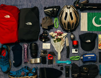Camping supplies laid out on floor