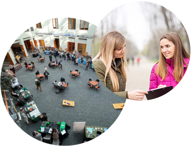 Researcher asking woman questions and hospitality fair bird's eye view