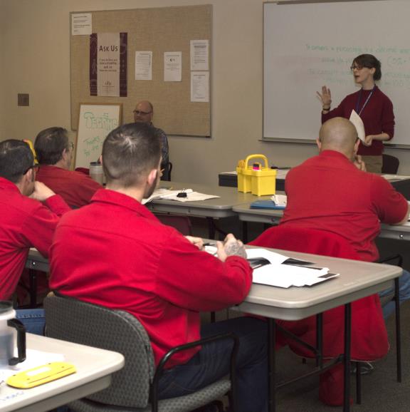 Dr. Susan Dewey lectures students at the Wyoming Honor Farm.